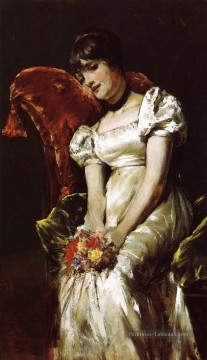 Jeune fille aux fleurs William Merritt Chase Peinture à l'huile